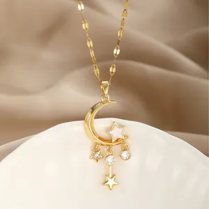 Exquisite gold moon and star tassel necklace with sparkling zircon dangles on silk