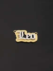 Close-up of gothic Leo zodiac pendant with silver finish on a frosted gold base