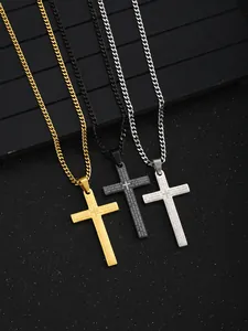 Detailed view of three-color cross pendants with Lord's Prayer laser engraving