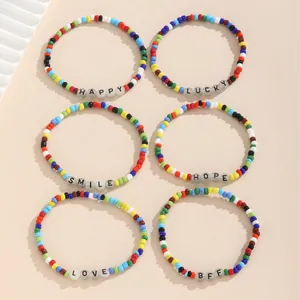 Set de seis pulseras de la amistad de cuentas coloridas con Happy, Lucky, Smile y Hope