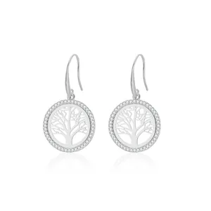 Detailed close-up of tree of life drop earrings with cubic zirconia halo in silver finish