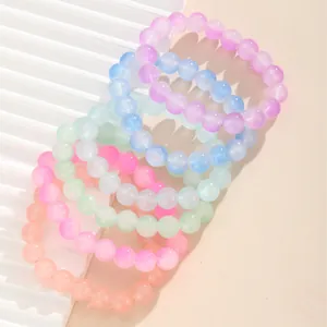 Set de pulseras de cuentas de vidrio esmerilado en colores pastel en expositor