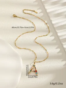 Detail showing dimension and weight of gold letter A pendant with colorful zircons