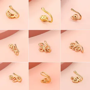 Set of 9 gold flower and heart non-piercing nose clips with inlaid zircons for women
