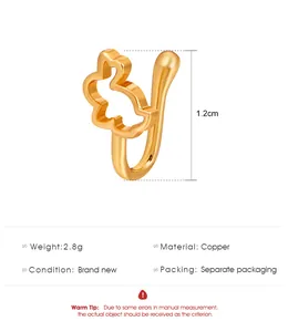 Detail of bunny-shaped gold copper nose cuff showing 1.2cm height and 2.8g weight specs