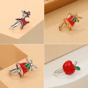 U-shaped non-pierced Christmas nose clips featuring reindeer, bells, and apple charms