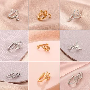 Lot de neuf bagues de nez en U non percées et faux piercings en finitions or et argent