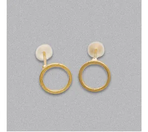 Close-up of golden geometric circle stud earrings with clear silicone security backs