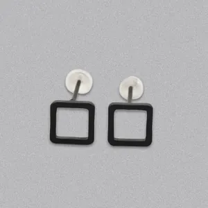 Minimalist black hollow square geometric earrings with industrial matte finish and silicone plugs
