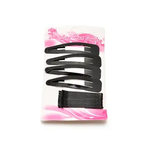 Set of black metal hair clips including 4 snap pins and bobby pins on white card