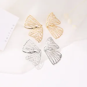 Chic hollow butterfly wing studs in gold and silver finish with intricate metal textures