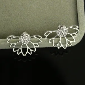 Elegant silver hollow lotus stud earrings with shimmering clear pavé rhinestones