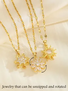 Rotating gold clover necklace with zircon crystals and opal pendants on silk background