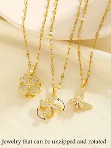 Detailed set of golden necklaces featuring a rotating zircon clover and butterfly charms