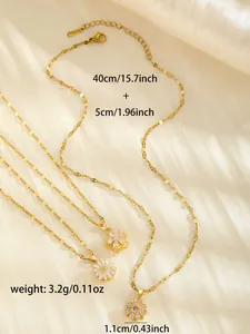 Detailed specs of three gold flower necklaces with size and weight on silk fabric