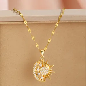 Chic gold celestial necklace with sun and moon pendant inlaid with white zircon stones