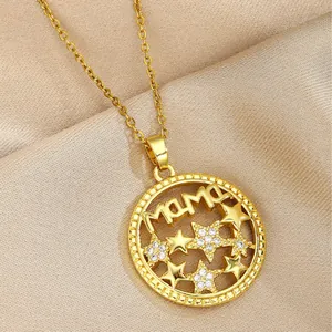 Elegant gold-tone Mama heart necklace with zircon stars on silk background