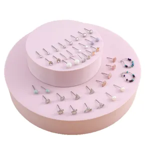 Set van 20 paar legering oorknopjes met parels en kristallen op roze displaystandaard