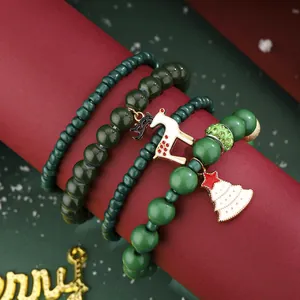 Christmas 4-piece elastic beaded bracelet set with reindeer and xmas tree charms