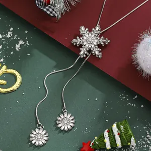 Silver snowflake tassel pendant necklace with sparkling zircons for Christmas theme
