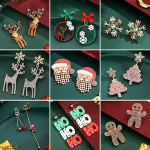 Christmas earrings collection featuring reindeer, Santa Claus, and festive gingerbread man