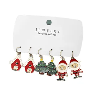 Christmas alloy earrings set with Santa, tree, and house designs and colorful crystals