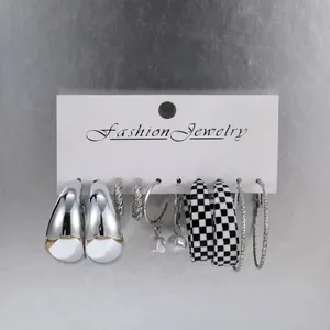 Detail view of 6-pair silver earring set with geometric hoops and imitation pearls