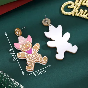 Cute gingerbread man Christmas earrings with pink hat and white back detail, 5.7cm size