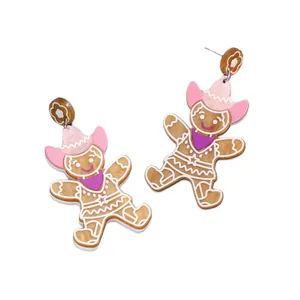 Cute gingerbread man earrings with pink cowboy hats for Christmas festive style