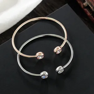 Minimalistische offene Zirkon-Armreifen in Roségold und Silber mit polierter Oberfläche