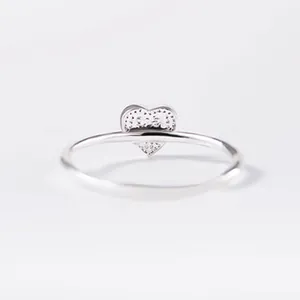 Close-up of S925 sterling silver stamp on the back of the heart shaped fashion ring