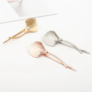 Elegant calla lily hair clips with pearls in gold, silver, and rose gold finish
