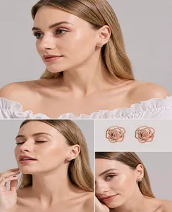 Detailed view of hollow rose gold flower earrings with crystals and three-layer plating