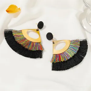 Bohemian hollow fan-shaped tassel earrings with gold metal and black fabric accents