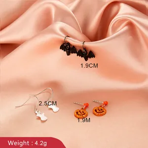 Halloween earring set featuring black bats, white ghosts, and orange glitter pumpkins