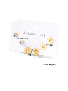 Three-piece gold stainless steel earring set featuring rhinestones, stars and moon shapes