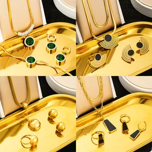 Elegant gold plated stainless steel jewelry sets with emerald stones and black enamel