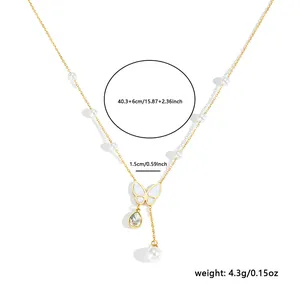 Gold stainless steel necklace with white shell butterfly, pearls, and teardrop zircon