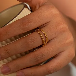 Double-layer gold beaded ring in stainless steel for women with minimalist geometric style