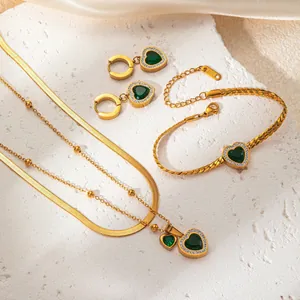 Gold double-layer butterfly jewelry set with green heart stones and snake chain