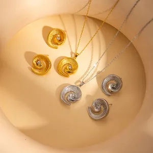 Elegant spiral stainless steel necklace and earring set with zircon in gold and silver