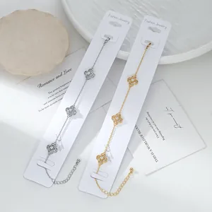 Braccialetti a quadrifoglio placcati oro e argento con zirconi e catena regolabile