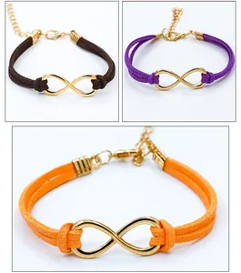 Close-up of infinity symbol bracelets in brown, purple and orange with adjustable clasps