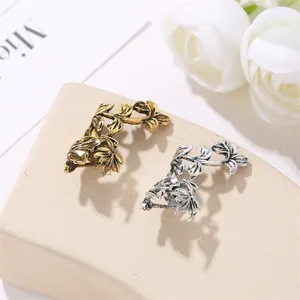Retro hollow leaf ear cuffs in antique gold and silver finishes for a vintage style