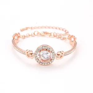 Elegant rose gold bracelet featuring a large round zircon center stone and adjustable chain