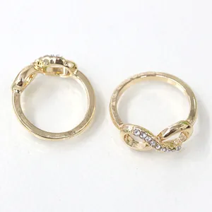Luxury gold infinity rings set with sparkling crystals and polished finish for women