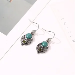 Böhmische Retro-Türkis-Ohrhänger mit hohlem Schnitzdesign aus Vintage-Silber
