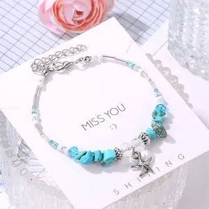 Pulsera bohemia de piedras naturales azules con colgante de estrella de mar para playa