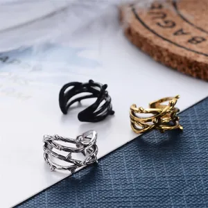 Thorn design wrap ear clips and open rings in silver, gold, and black finishes