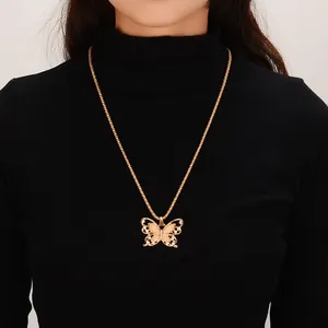 Elegante Collar Con Colgante de Mariposa de Aleación Para Mujer Joyería Hueca Con Diamantes de Imitación y Ojo de Gato Artificial Cadena Larga Para Suéter